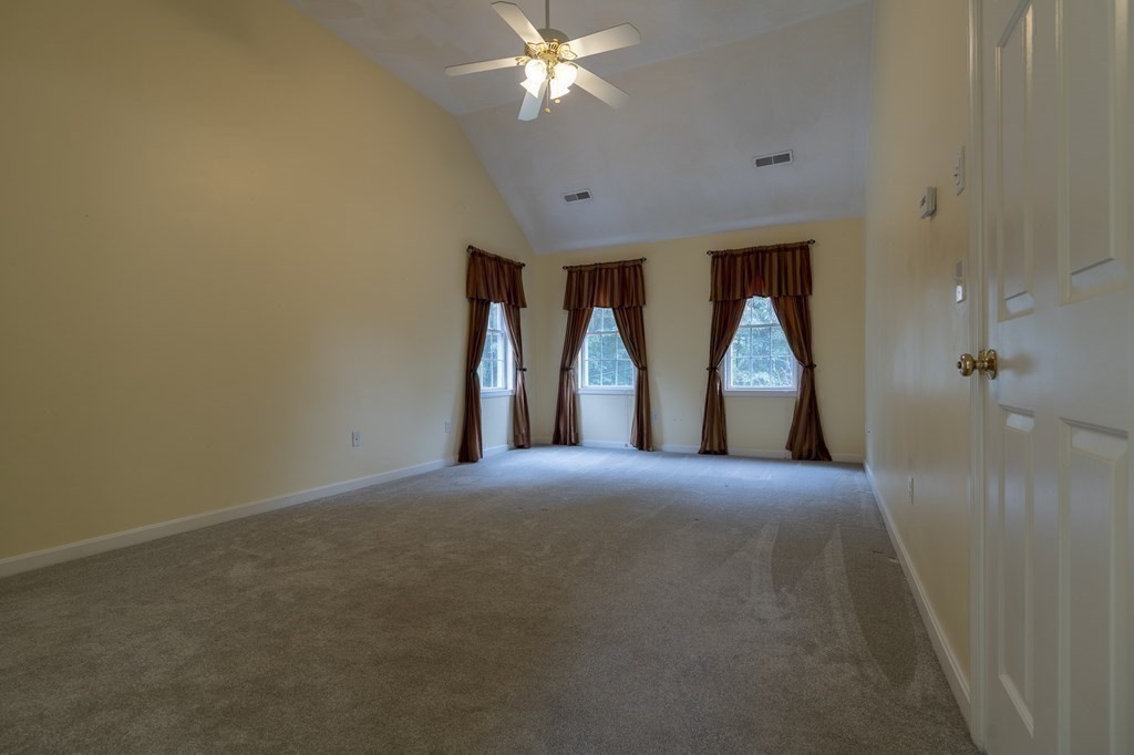 31 Hickory Lane Hudson, MA 01749 - Photo 15 of 40 a view of empty room with ceiling fan