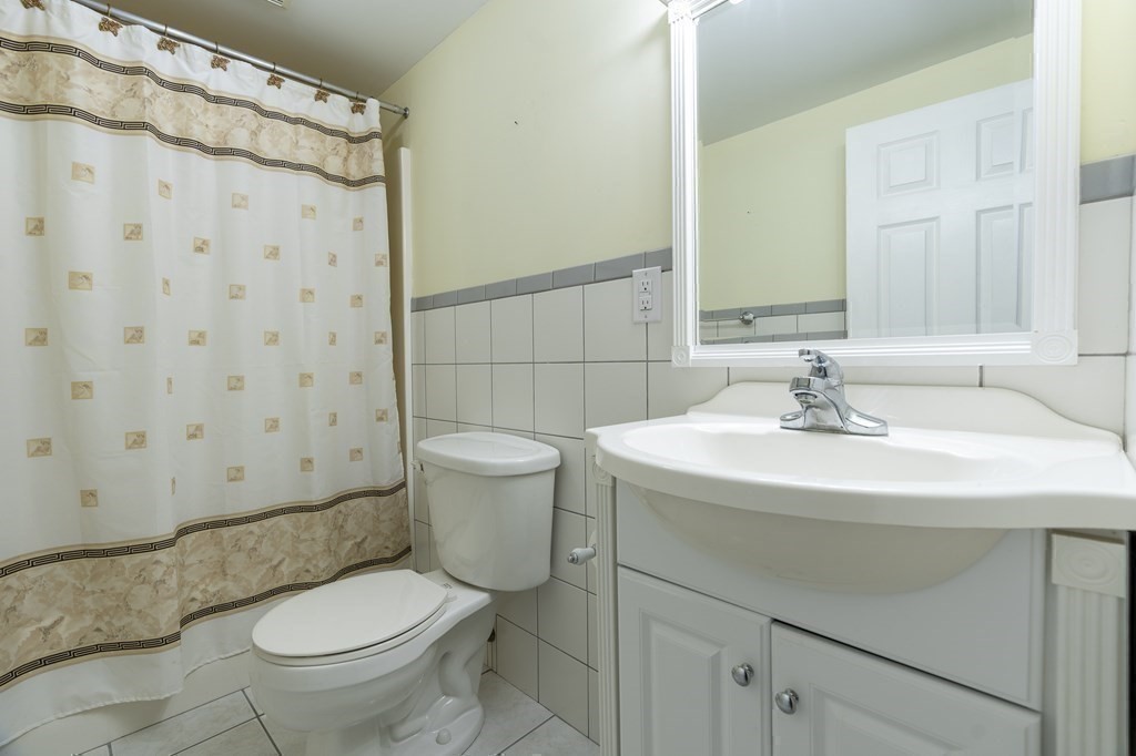 31 Hickory Lane Hudson, MA 01749 - Photo 24 of 40 a bathroom with a sink toilet and shower