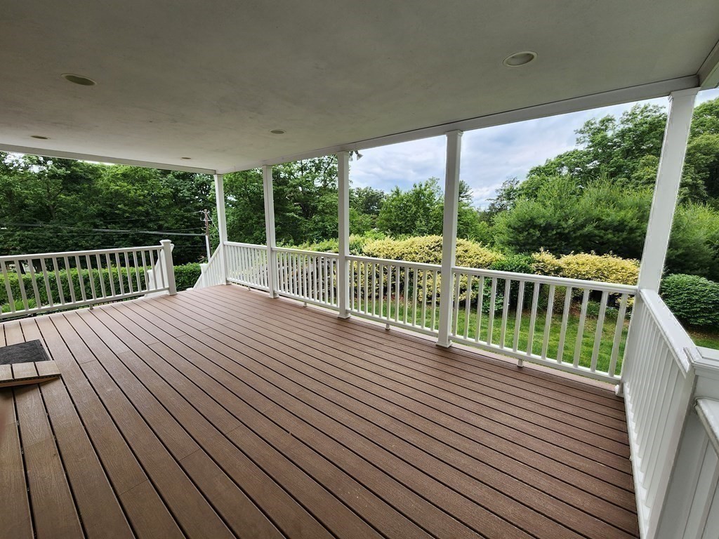 31 Hickory Lane Hudson, MA 01749 - Photo 28 of 40 a balcony with wooden floor