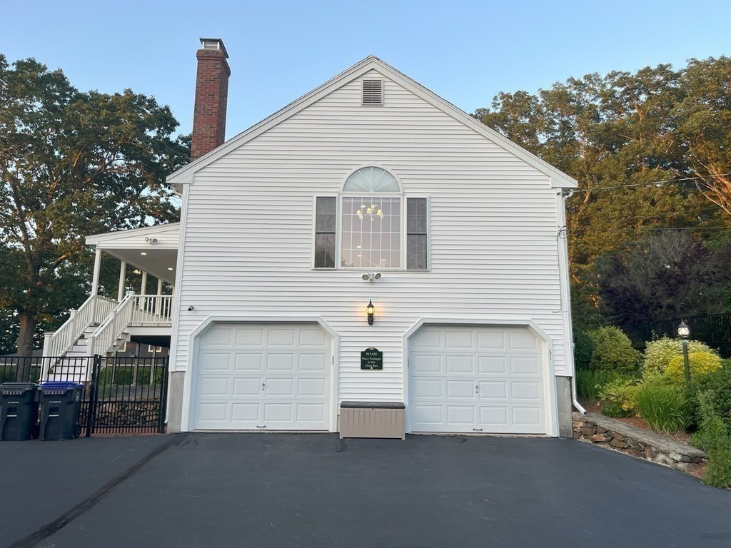 31 Hickory Lane Hudson, MA 01749 - Photo 34 of 40 a view of a white house with a street