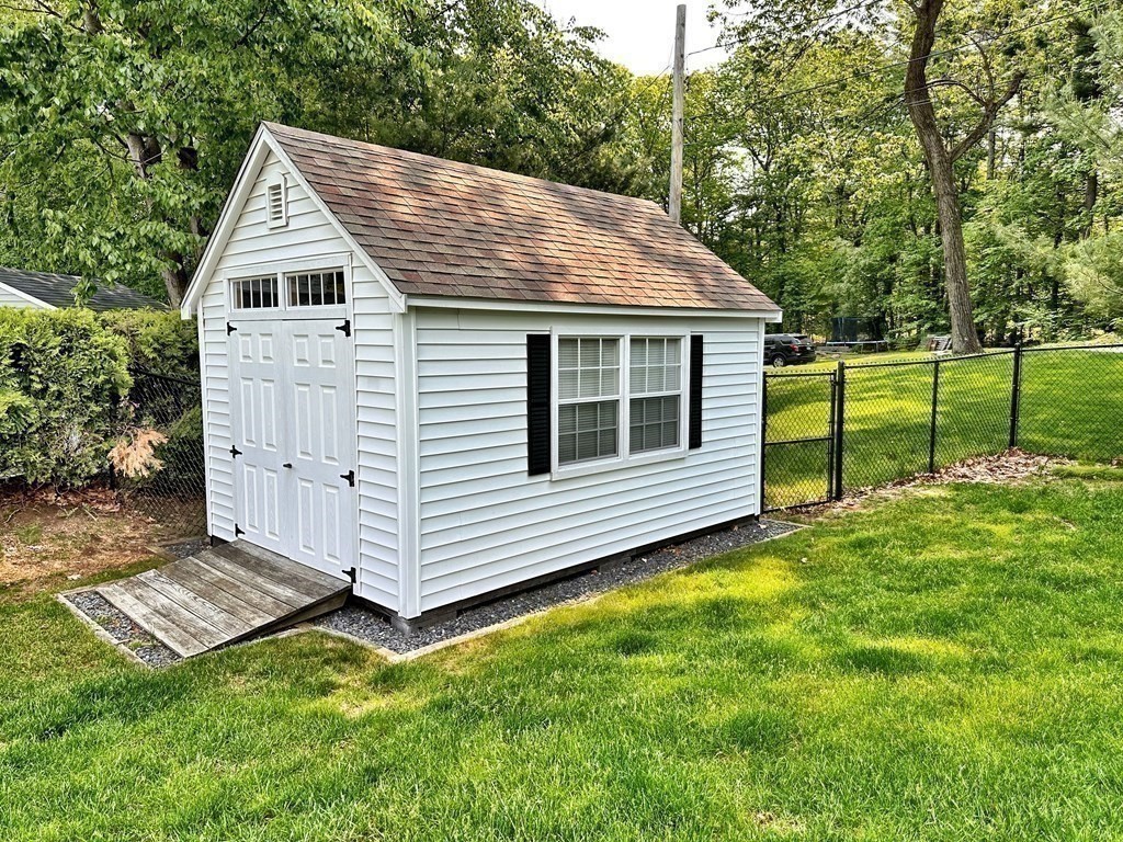 31 Hickory Lane Hudson, MA 01749 - Photo 37 of 40 a view of a house with a backyard