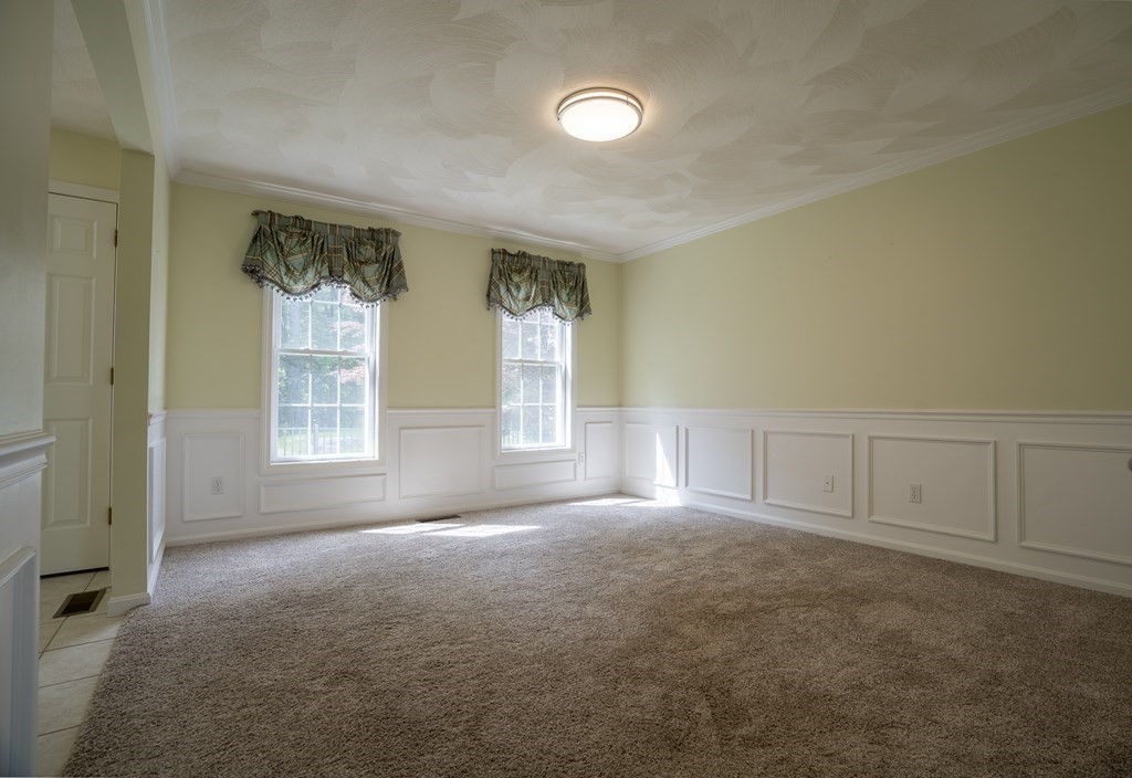 31 Hickory Lane Hudson, MA 01749 - Photo 7 of 40 an empty room with windows