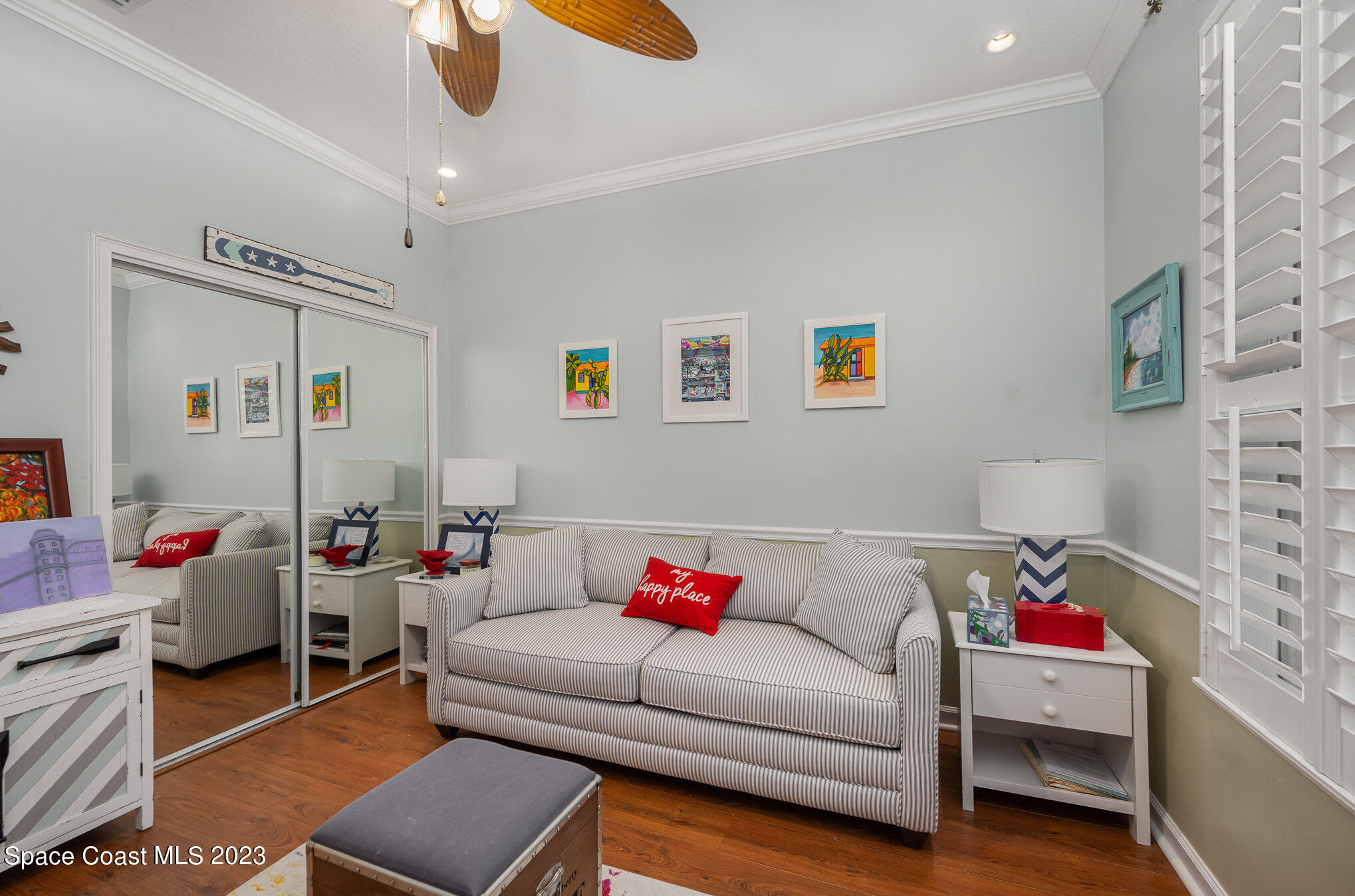 6972 Premonition Drive Melbourne, FL 32940 - Photo 26 of 33 a living room with furniture and a couch