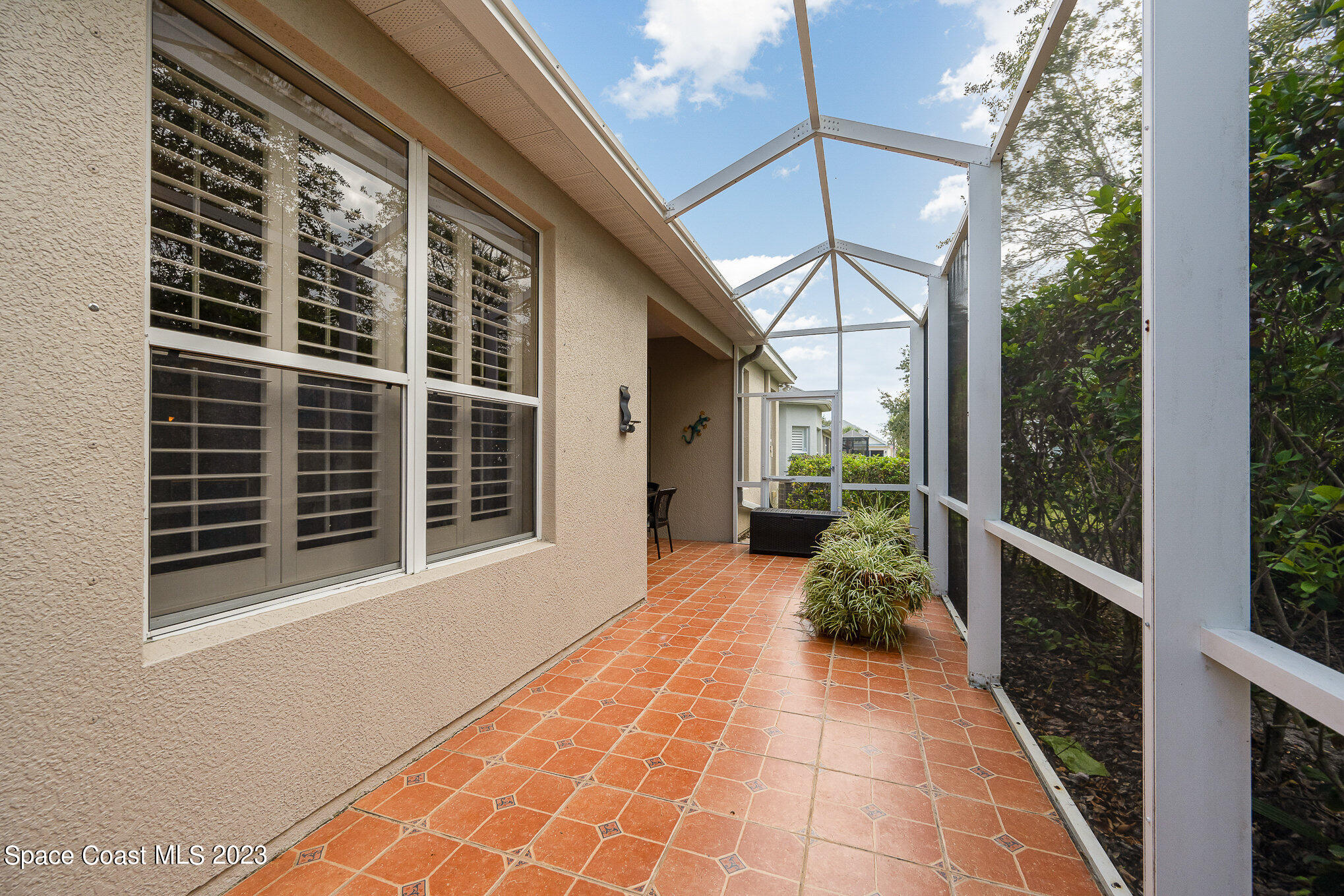6972 Premonition Drive Melbourne, FL 32940 - Photo 32 of 33 a porch with seating space