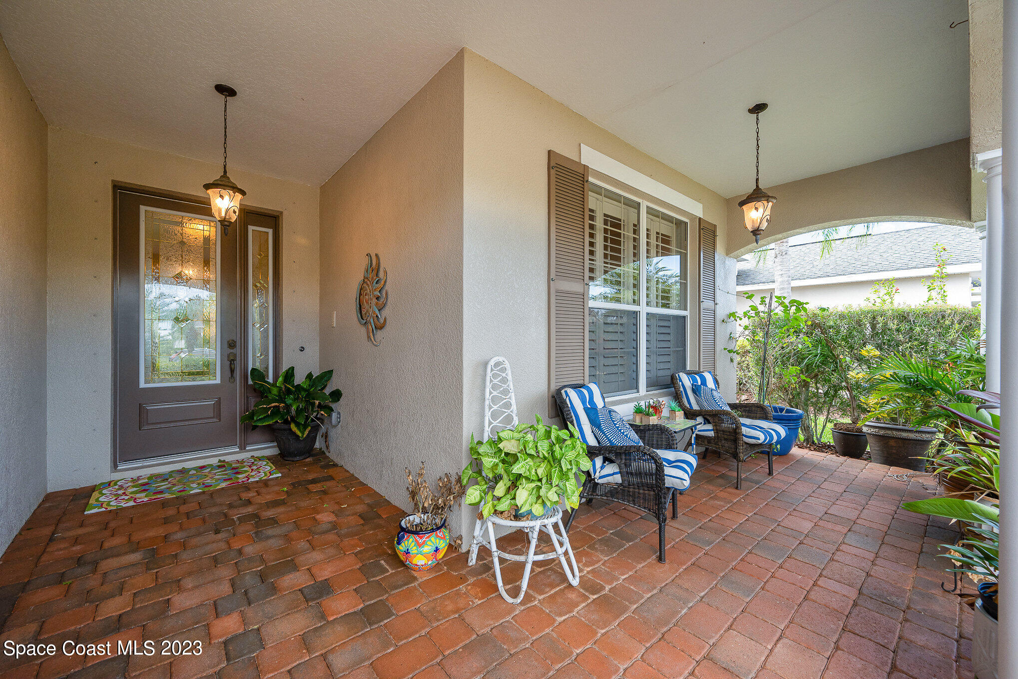 6972 Premonition Drive Melbourne, FL 32940 - Photo 4 of 33 a view of a dining room with furniture window and outside view