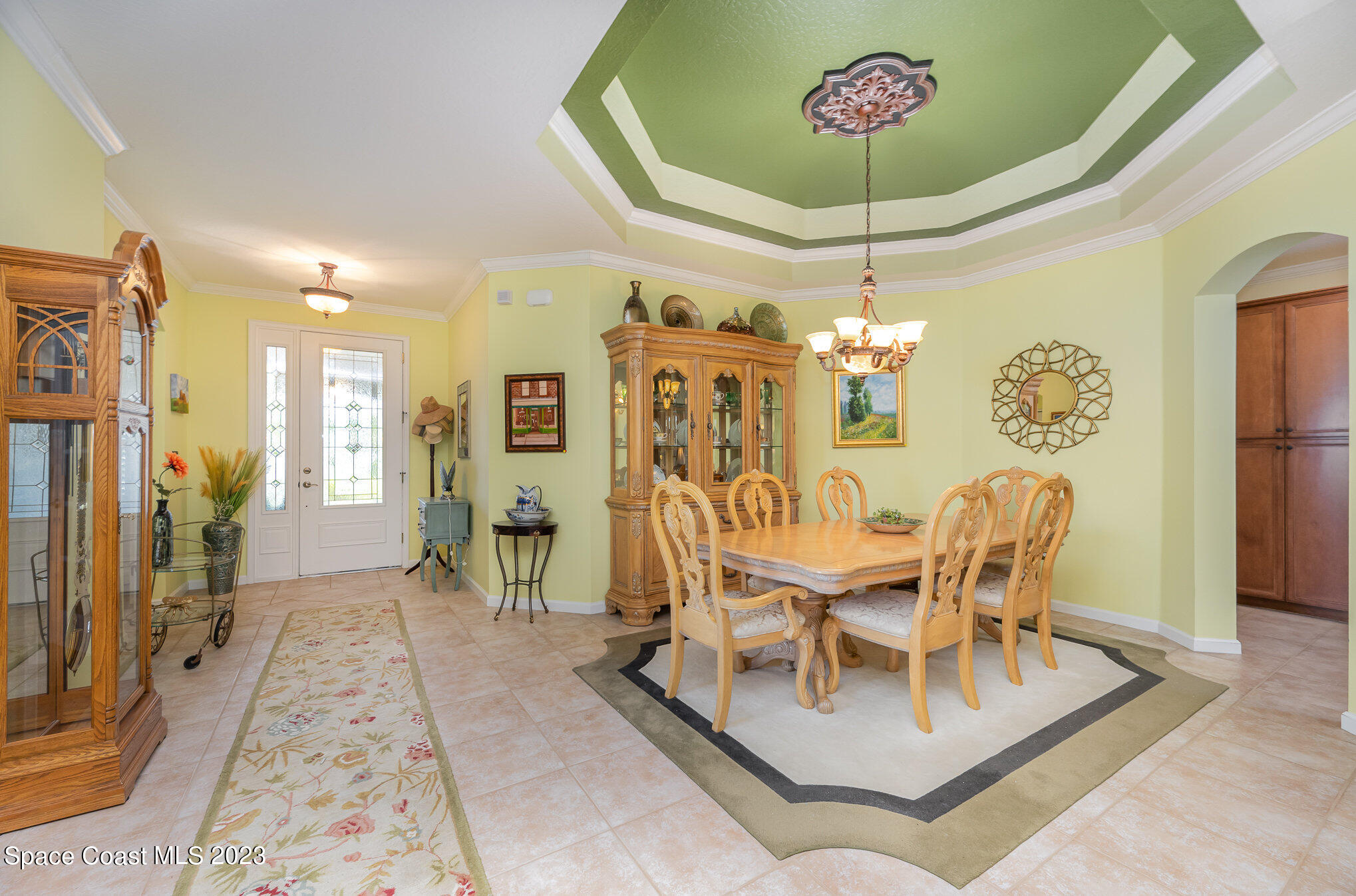 6972 Premonition Drive Melbourne, FL 32940 - Photo 5 of 33 a view of a dining room with furniture