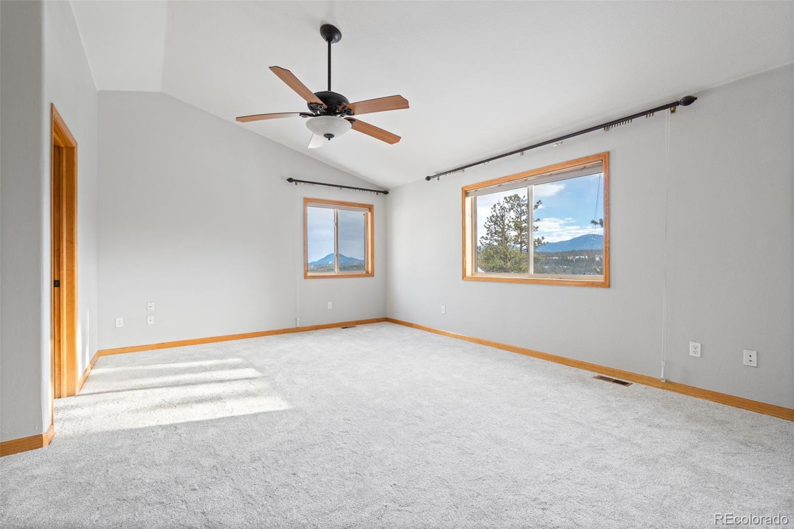 377 Deer Trail Drive Bailey, CO 80421 - Photo 14 of 44 a view of an empty room with a window
