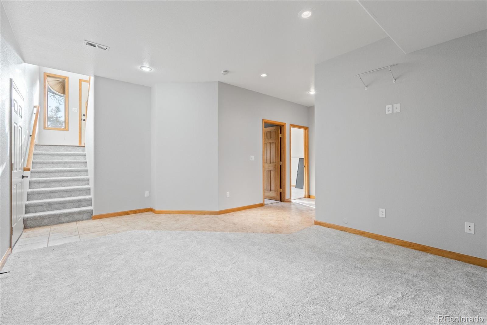 377 Deer Trail Drive Bailey, CO 80421 - Photo 21 of 44 a view of an empty room with a window