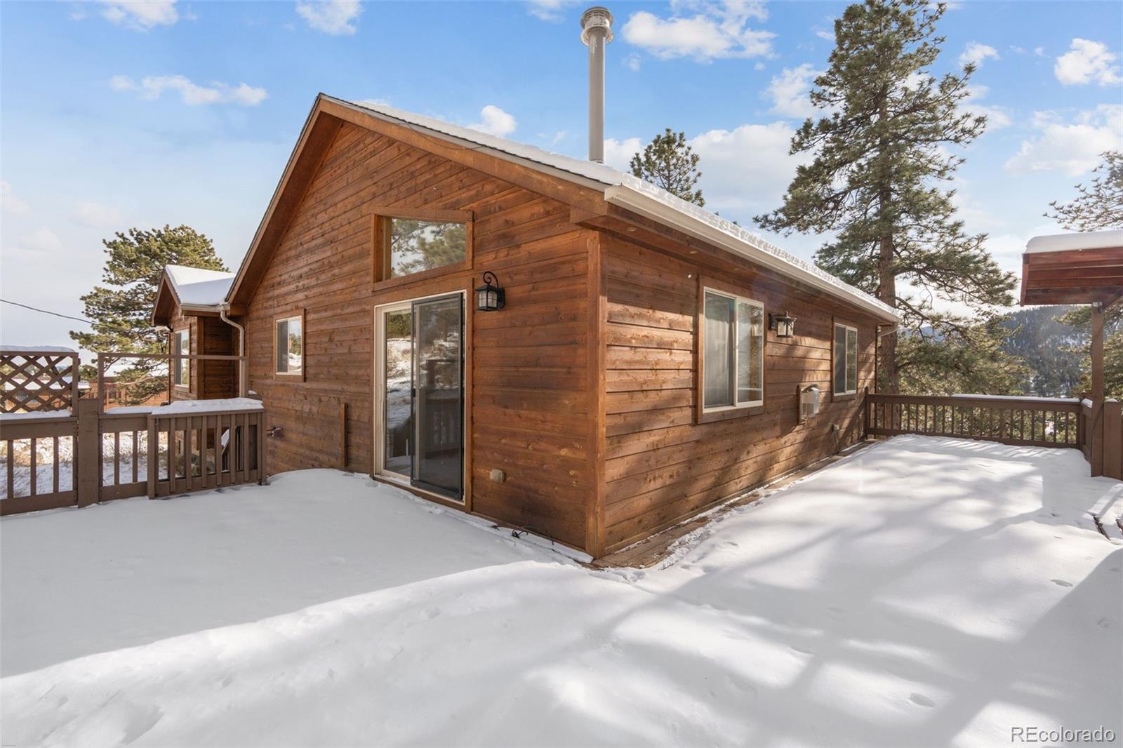 377 Deer Trail Drive Bailey, CO 80421 - Photo 29 of 44 a view of backyard of house