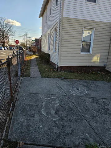 a view of a back yard of the house