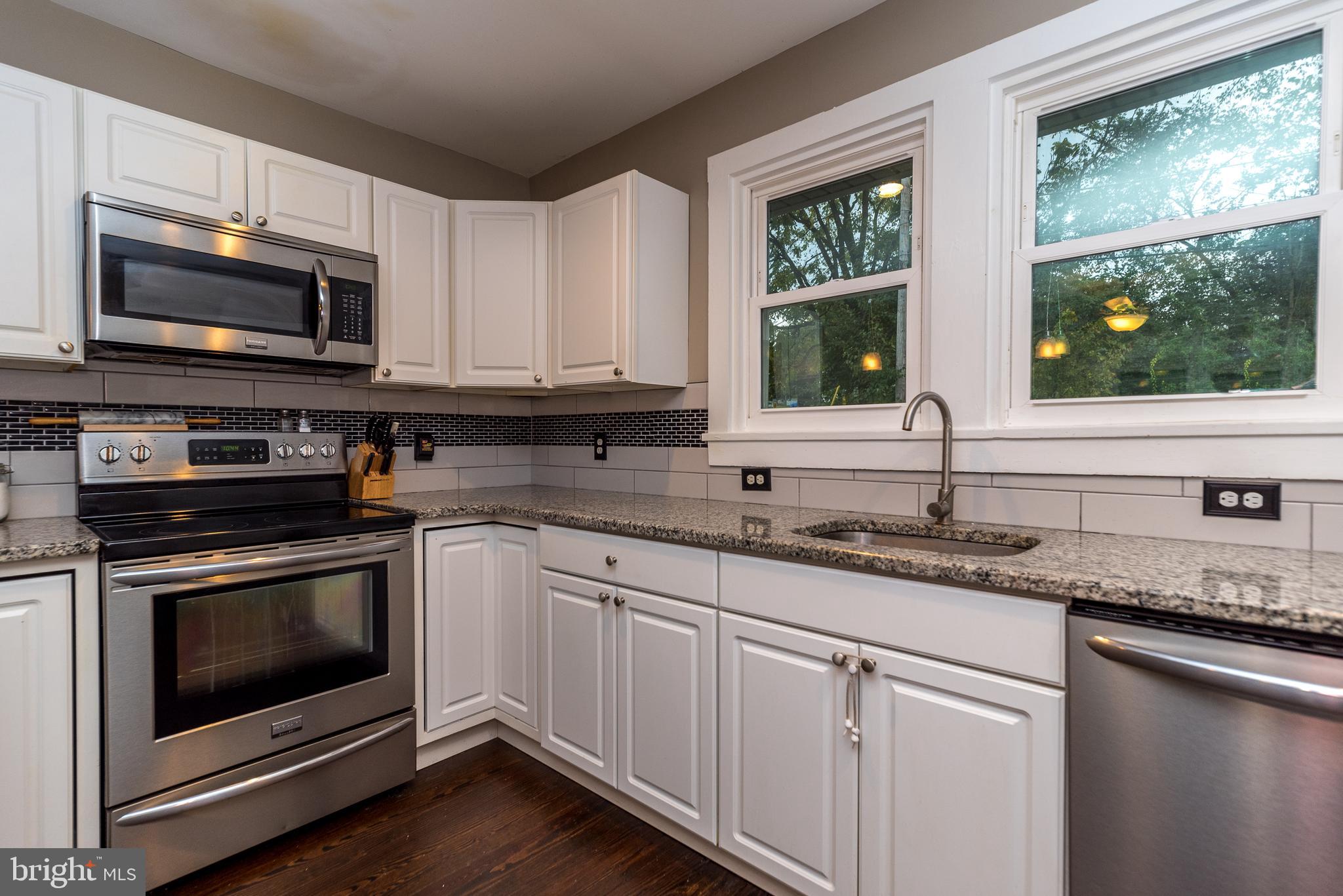 404 Dresher Road, Unit C Horsham, PA 19044 - Photo 3 of 25 Kitchen with newer stainless steel appliances.