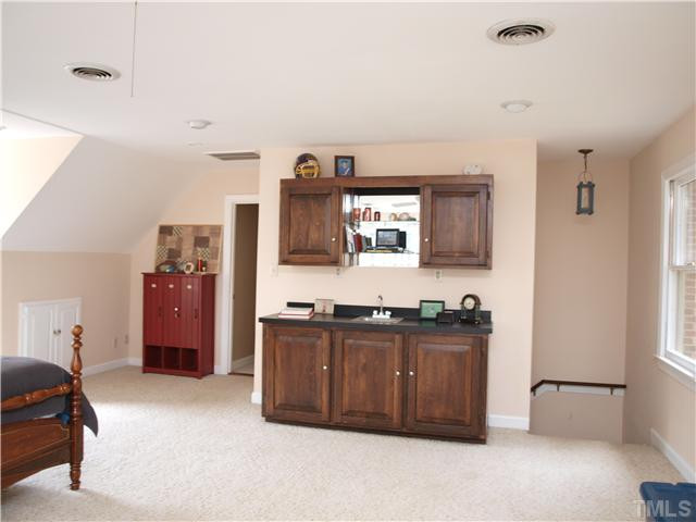 8305 Mourning Dove Road Raleigh, NC 27615 - Photo 18 of 24 Wet bar in Bedroom 4/Bonus Room