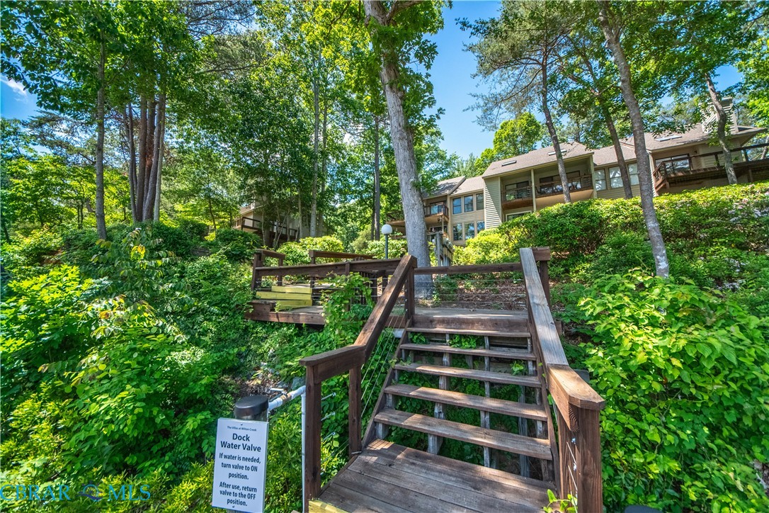 54 Villa Ridge Drive, Unit C Hartfield, VA 23071 - Photo 9 of 45 Deck featuring stairway
