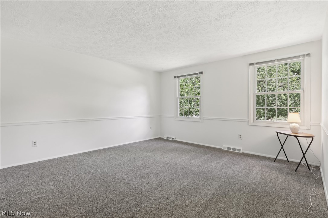 10253 Hoose Road Mentor, OH 44060 - Photo 23 of 30 Unfurnished room,fresh paint & carpet floors
