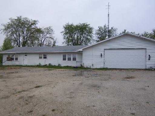 13669 State St Route Cortland, IL 60112 - Photo 1 of 1 a view of a house with a yard