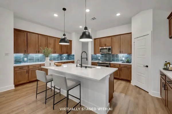 a bed room with a bed and a chair