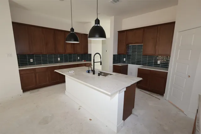 a bathroom with a sink and a bathtub