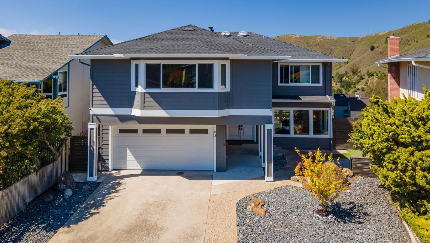 63 Kathleen Court Pacifica, CA 94044 - Photo 1 of 41 a front view of a house with a yard