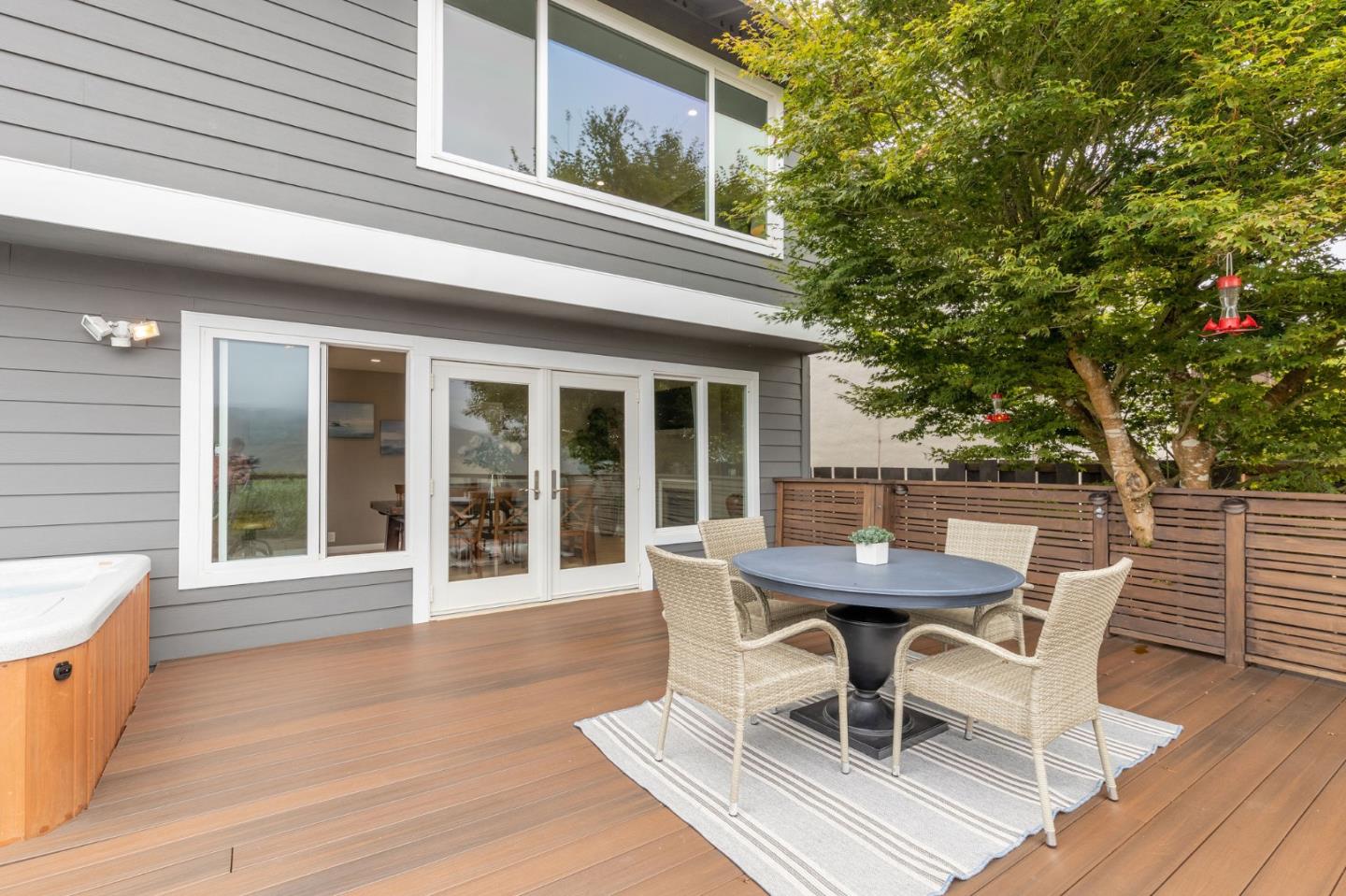 63 Kathleen Court Pacifica, CA 94044 - Photo 15 of 41 a dining room with furniture and wooden floor