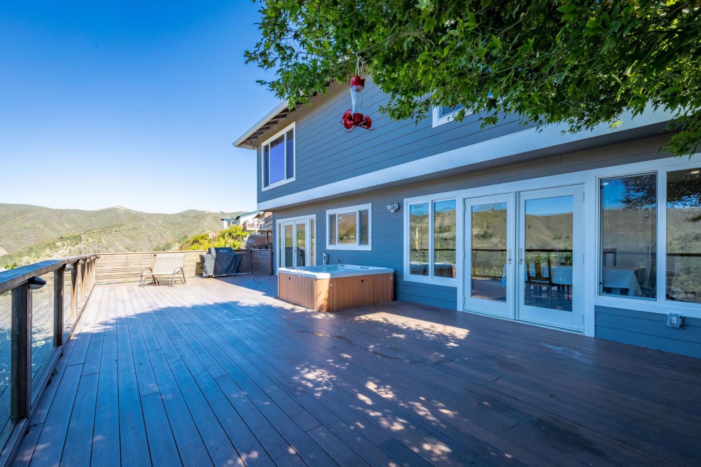 63 Kathleen Court Pacifica, CA 94044 - Photo 17 of 41 a house view with a seating space and a garden