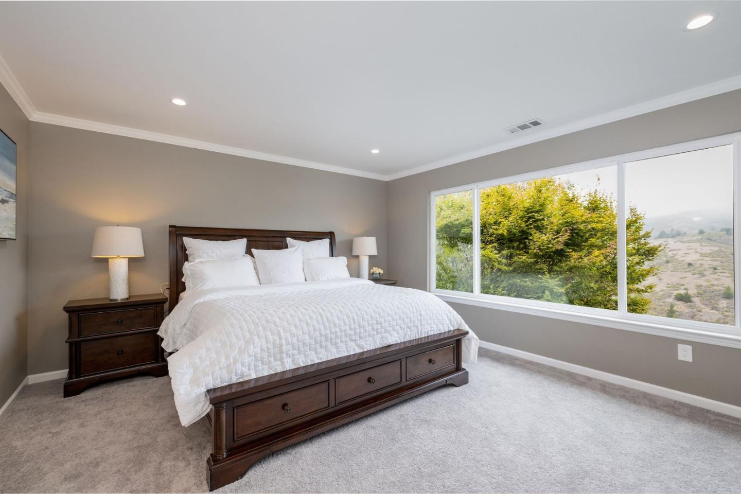 63 Kathleen Court Pacifica, CA 94044 - Photo 22 of 41 a bed sitting in a bedroom next to a window