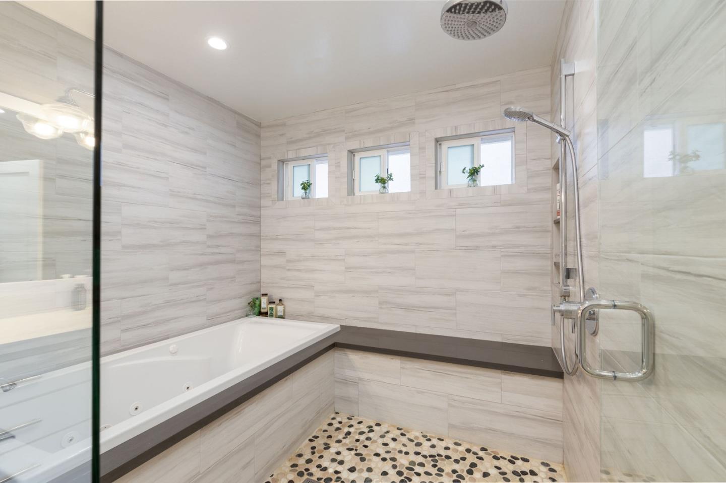 63 Kathleen Court Pacifica, CA 94044 - Photo 24 of 41 a bathroom with a bathtub and shower