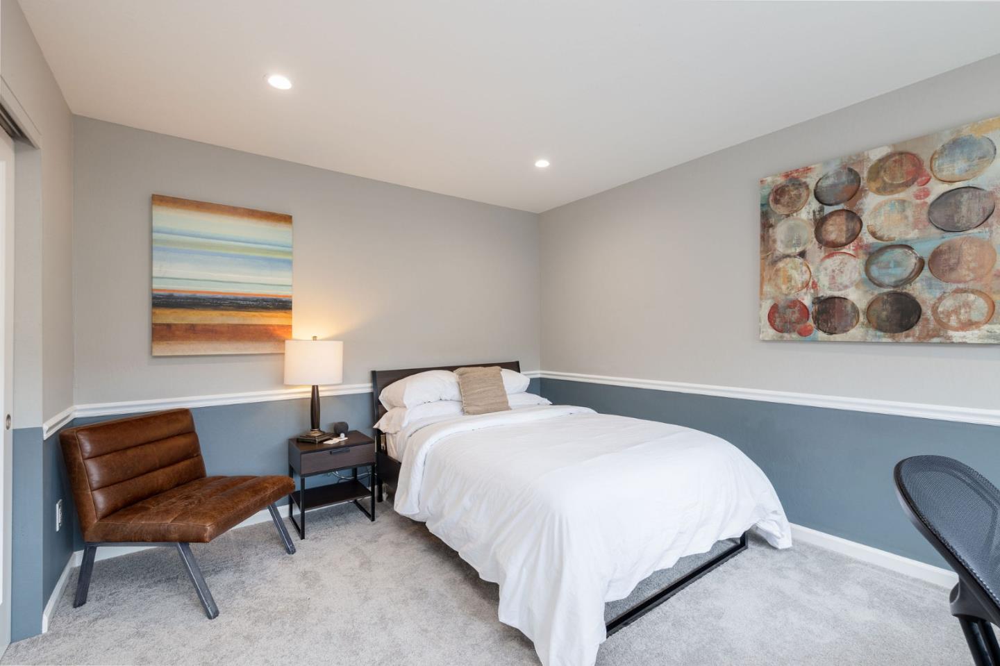 63 Kathleen Court Pacifica, CA 94044 - Photo 29 of 41 a bedroom with a bed and chair