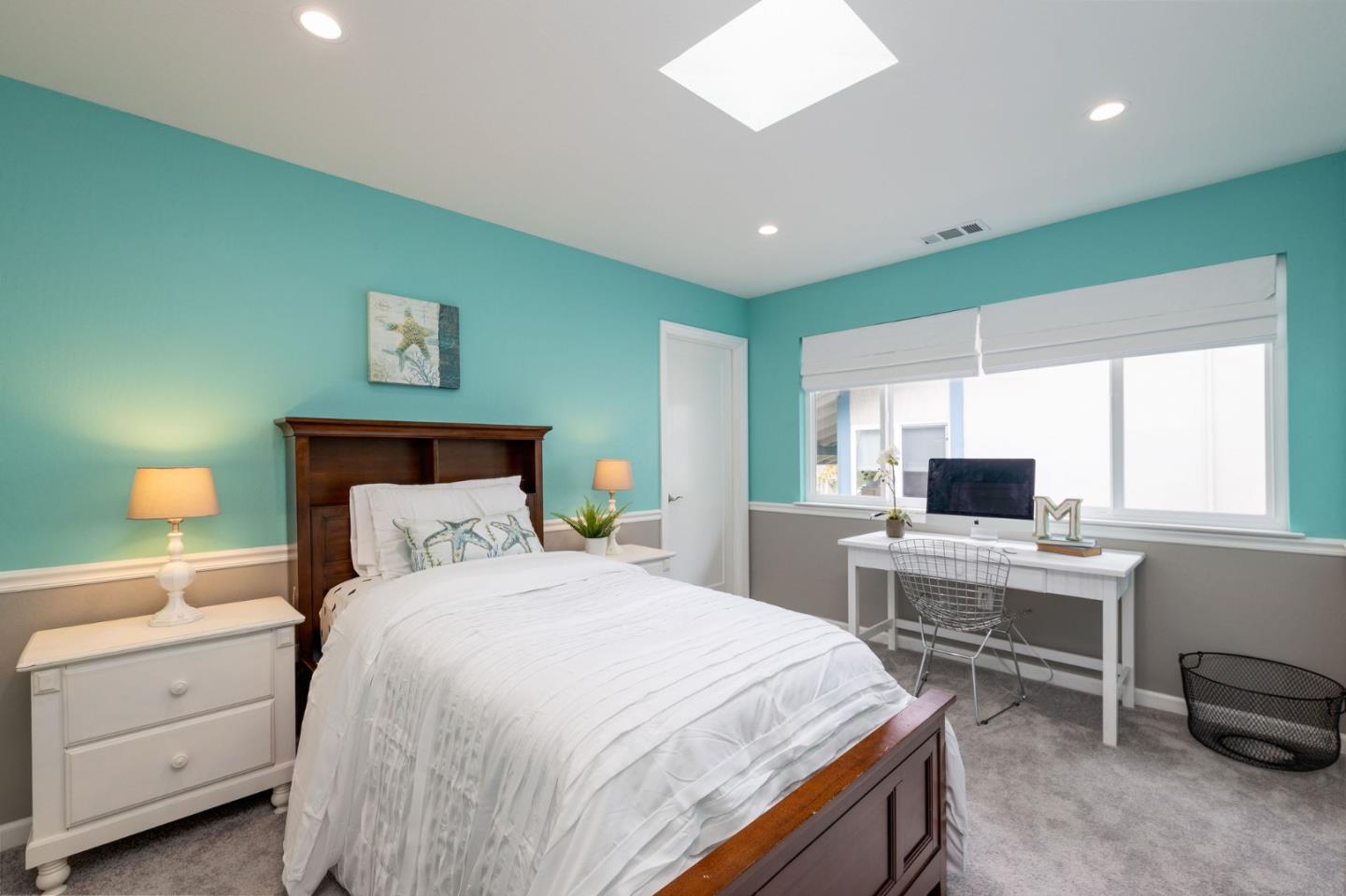 63 Kathleen Court Pacifica, CA 94044 - Photo 30 of 41 a bedroom with a bed and a desk