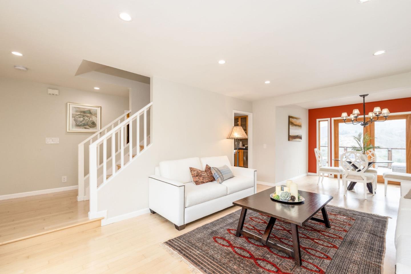 63 Kathleen Court Pacifica, CA 94044 - Photo 5 of 41 a living room with furniture and a table