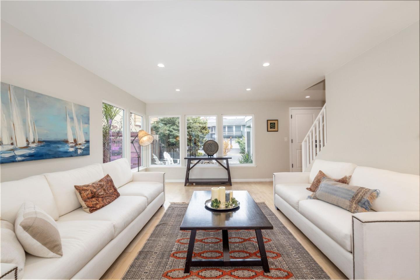 63 Kathleen Court Pacifica, CA 94044 - Photo 7 of 41 a living room with furniture and a table
