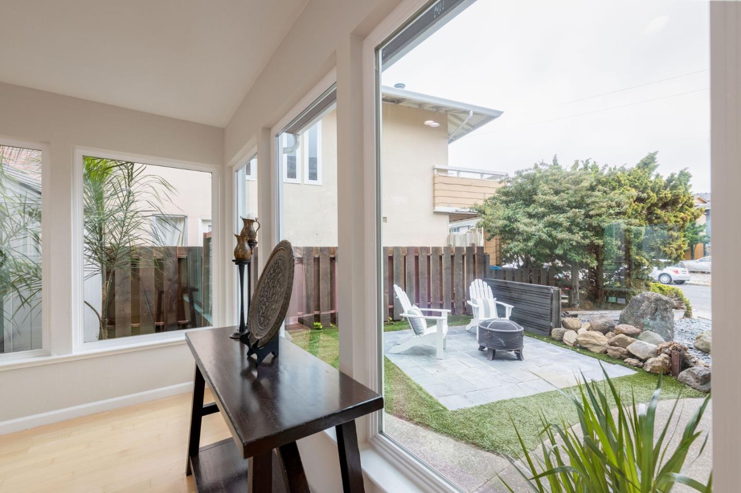 63 Kathleen Court Pacifica, CA 94044 - Photo 10 of 41 a view of a dining room with furniture window and outside view
