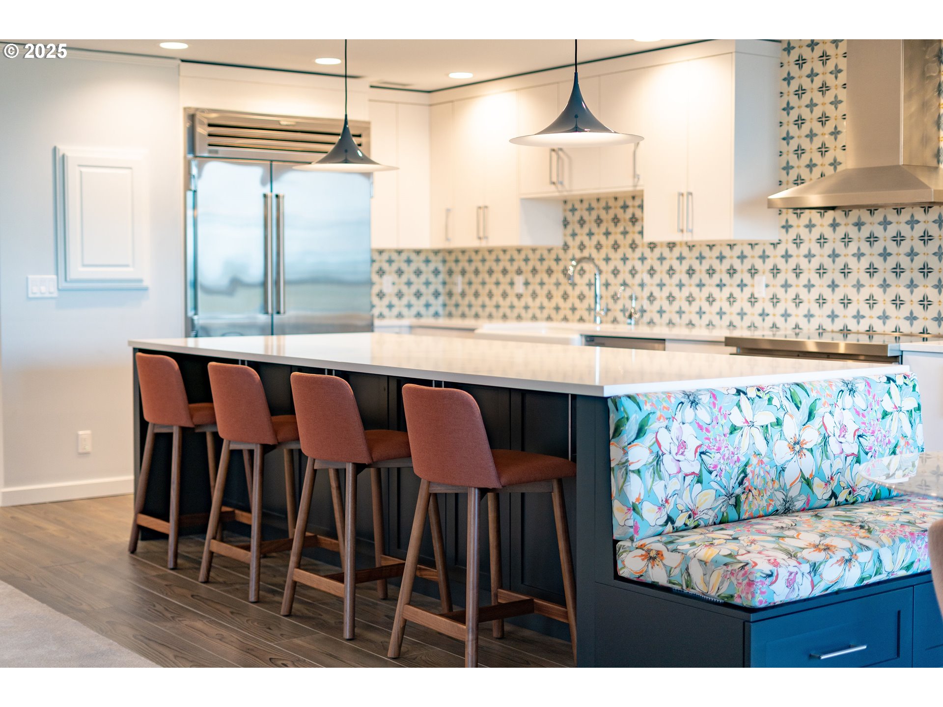 1414 Southwest 3rd Avenue, Unit 2902 Portland, OR 97201 - Photo 11 of 45 a kitchen with a dining table chairs and white cabinets