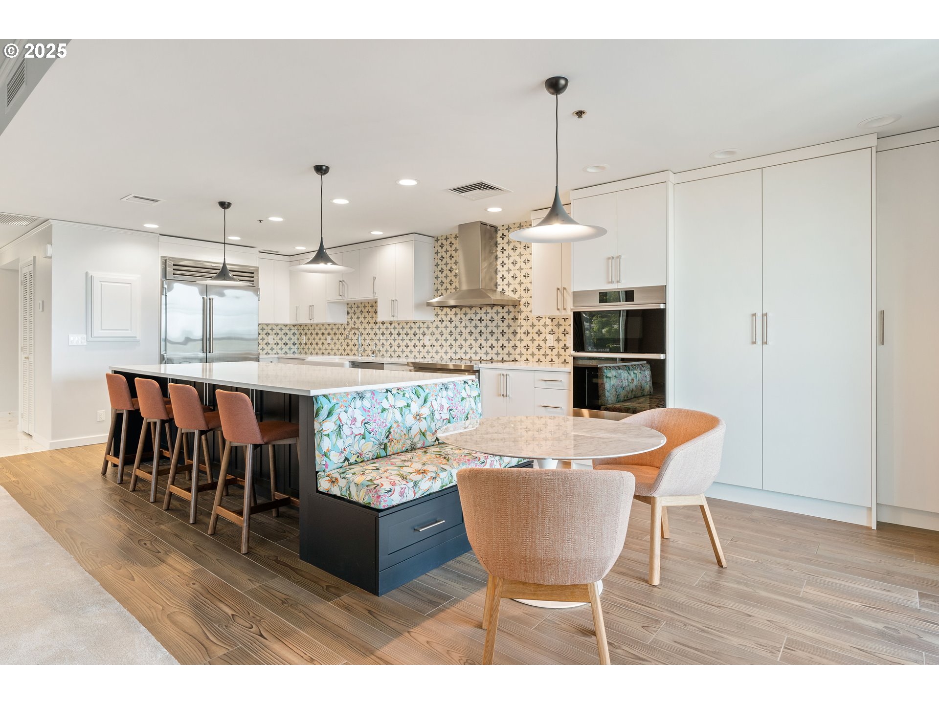 1414 Southwest 3rd Avenue, Unit 2902 Portland, OR 97201 - Photo 22 of 45 a living room with stainless steel appliances kitchen island granite countertop furniture and a wooden floor