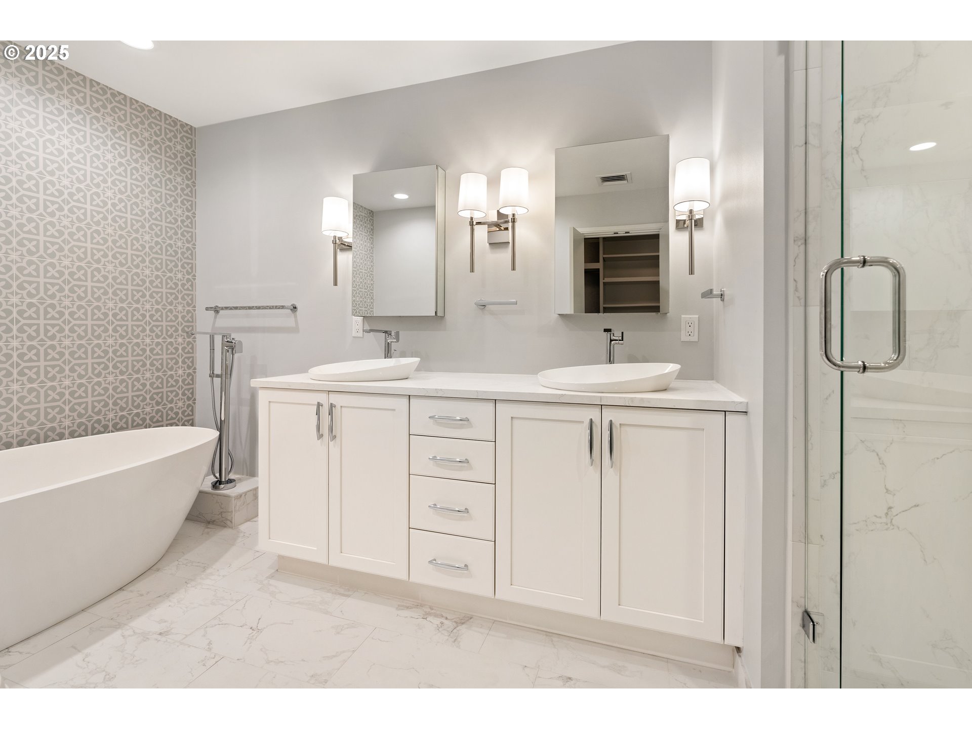 1414 Southwest 3rd Avenue, Unit 2902 Portland, OR 97201 - Photo 32 of 45 a bathroom with a double vanity sink mirror and bathtub