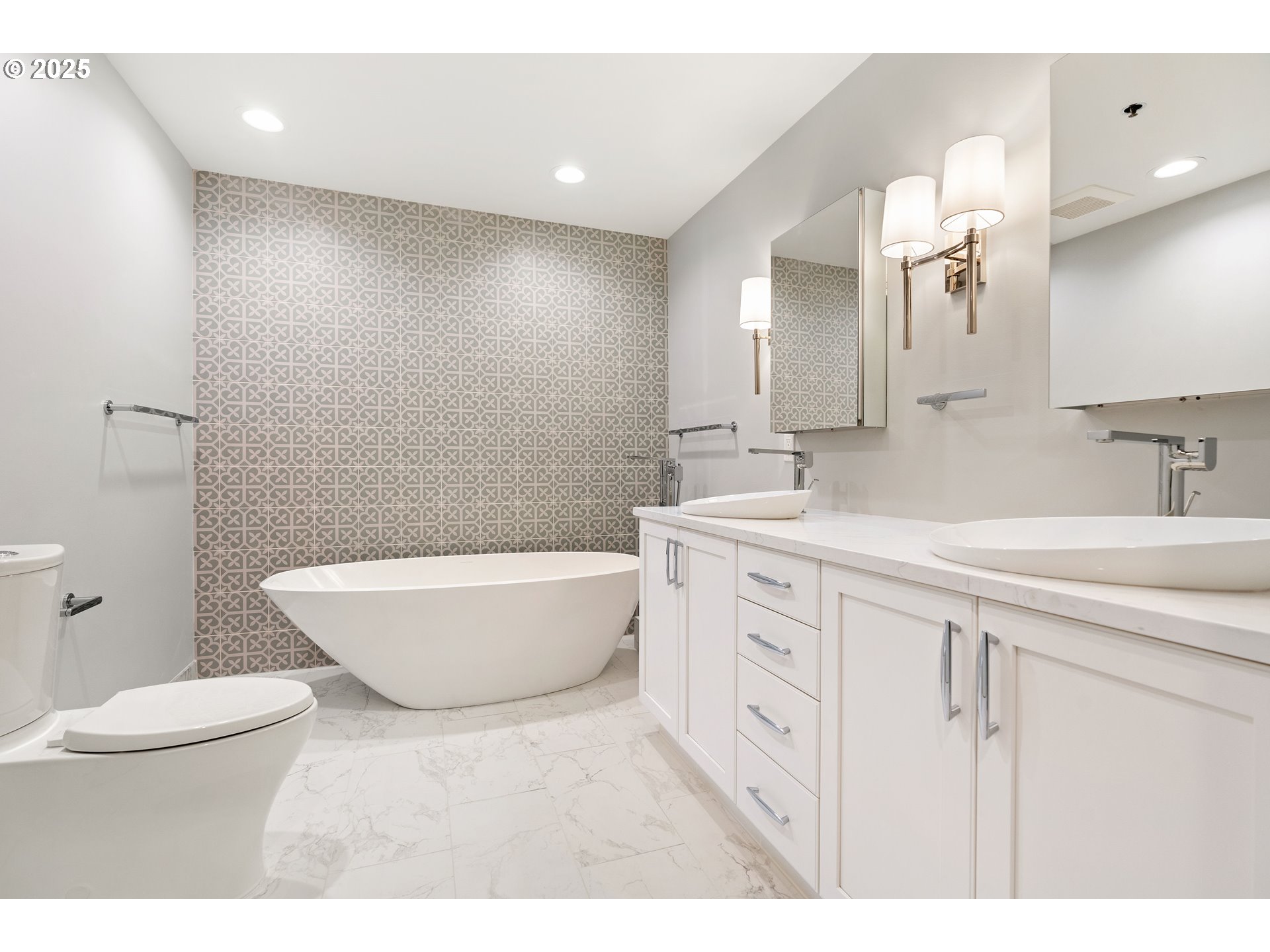 1414 Southwest 3rd Avenue, Unit 2902 Portland, OR 97201 - Photo 33 of 45 a bathroom with a granite countertop sink a toilet a mirror and bathtub
