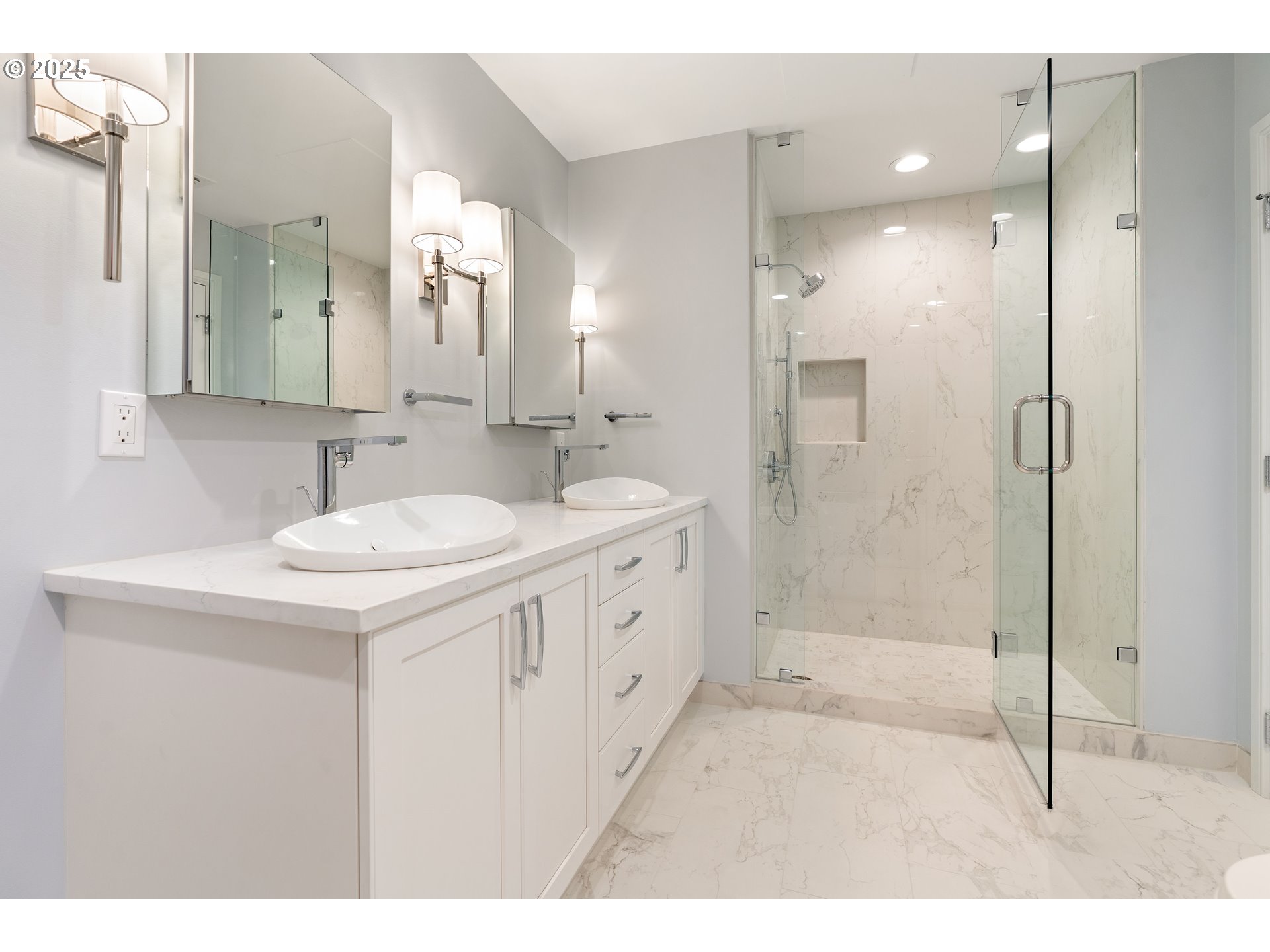 1414 Southwest 3rd Avenue, Unit 2902 Portland, OR 97201 - Photo 36 of 45 a bathroom with a double vanity sink mirror double and shower