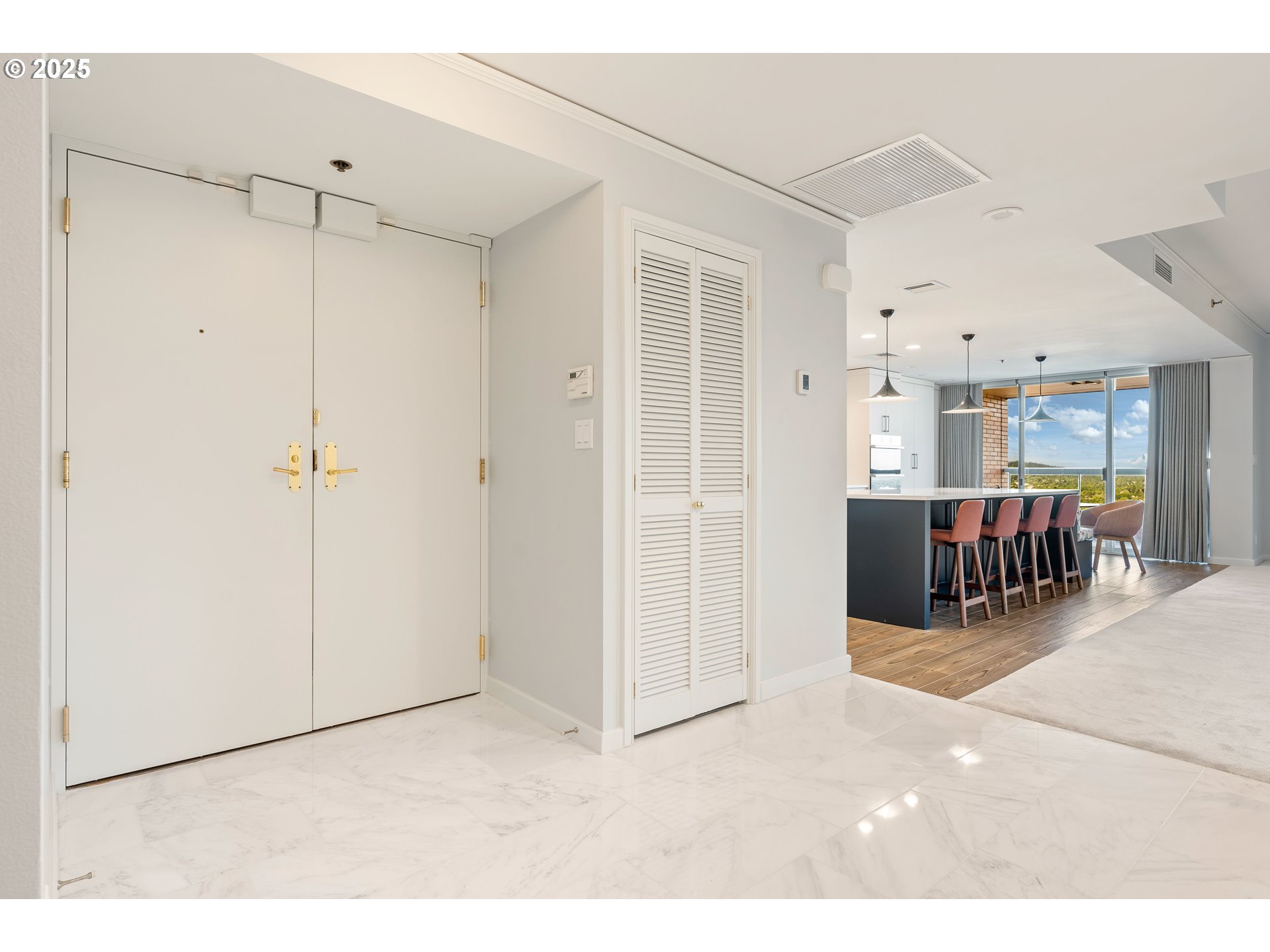 1414 Southwest 3rd Avenue, Unit 2902 Portland, OR 97201 - Photo 5 of 45 a living room with furniture a table and chairs