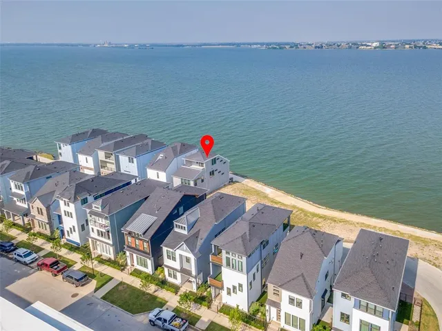 a terrace of a house with outdoor seating