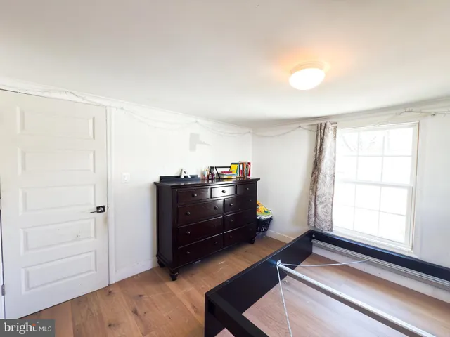 a room with furniture and a window