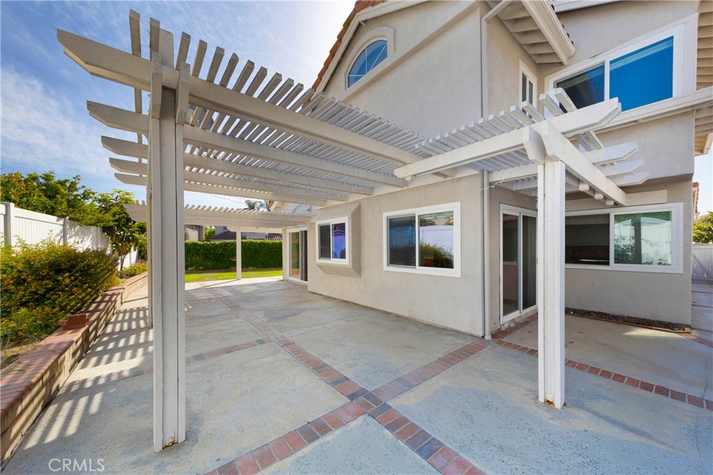 2 Bernini Irvine, CA 92614 - Photo 24 of 30 Open backyard with partial covering and easily accessible throughout home.
