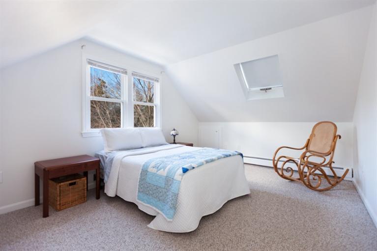 276 Bumps River Road Osterville, MA 02655 - Photo 16 of 29 a bedroom with a bed chair and window