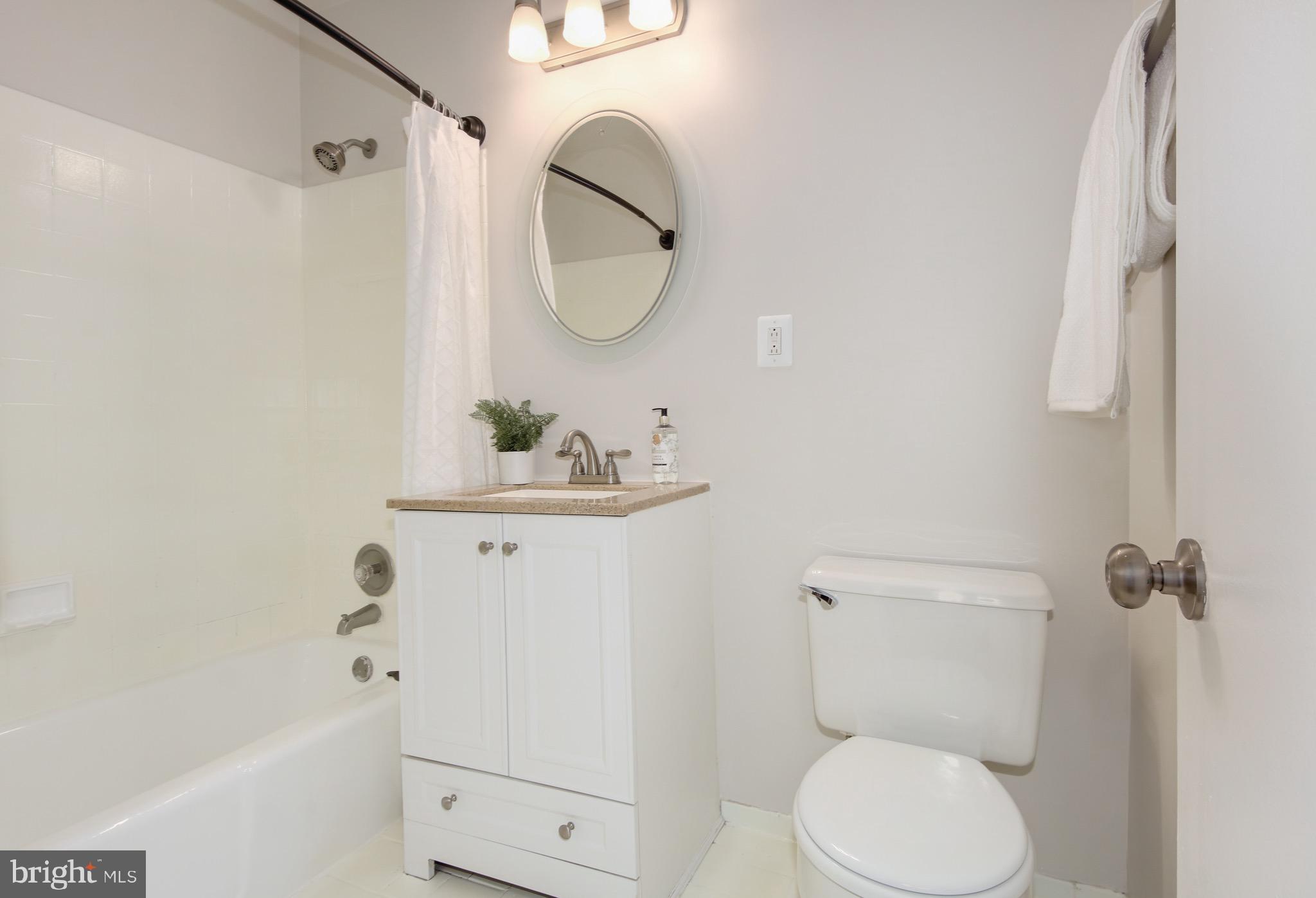 2235 Cartwright Place Reston, VA 20191 - Photo 20 of 43 Upper level hall bathroom with ceramic tile