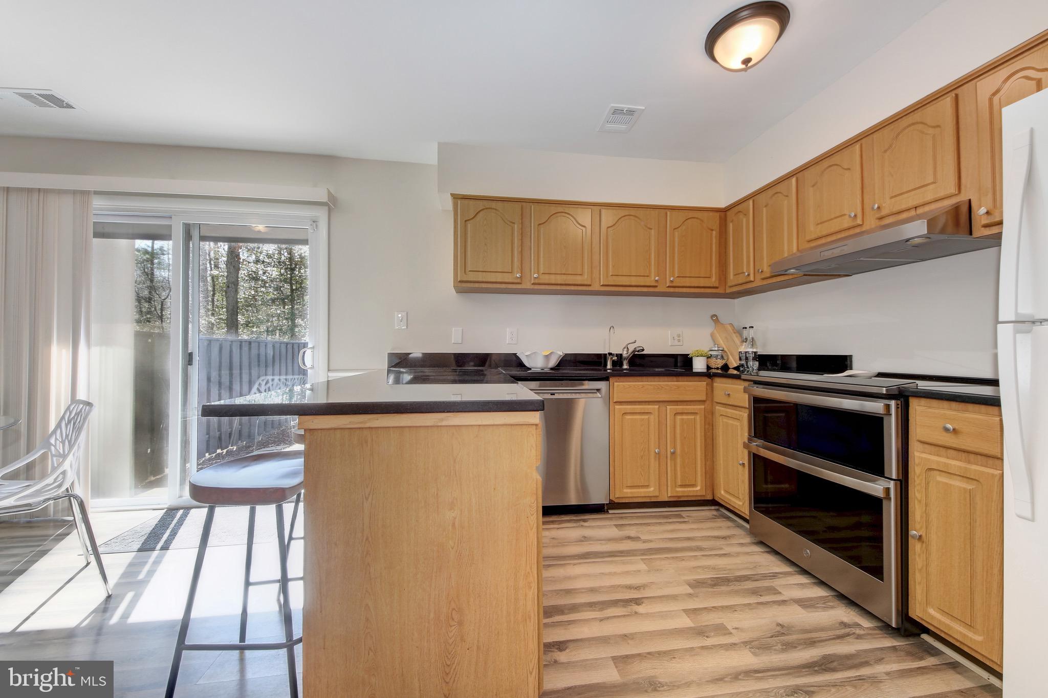 2235 Cartwright Place Reston, VA 20191 - Photo 8 of 43 Updated kitchen/dining is perfect for entertaining