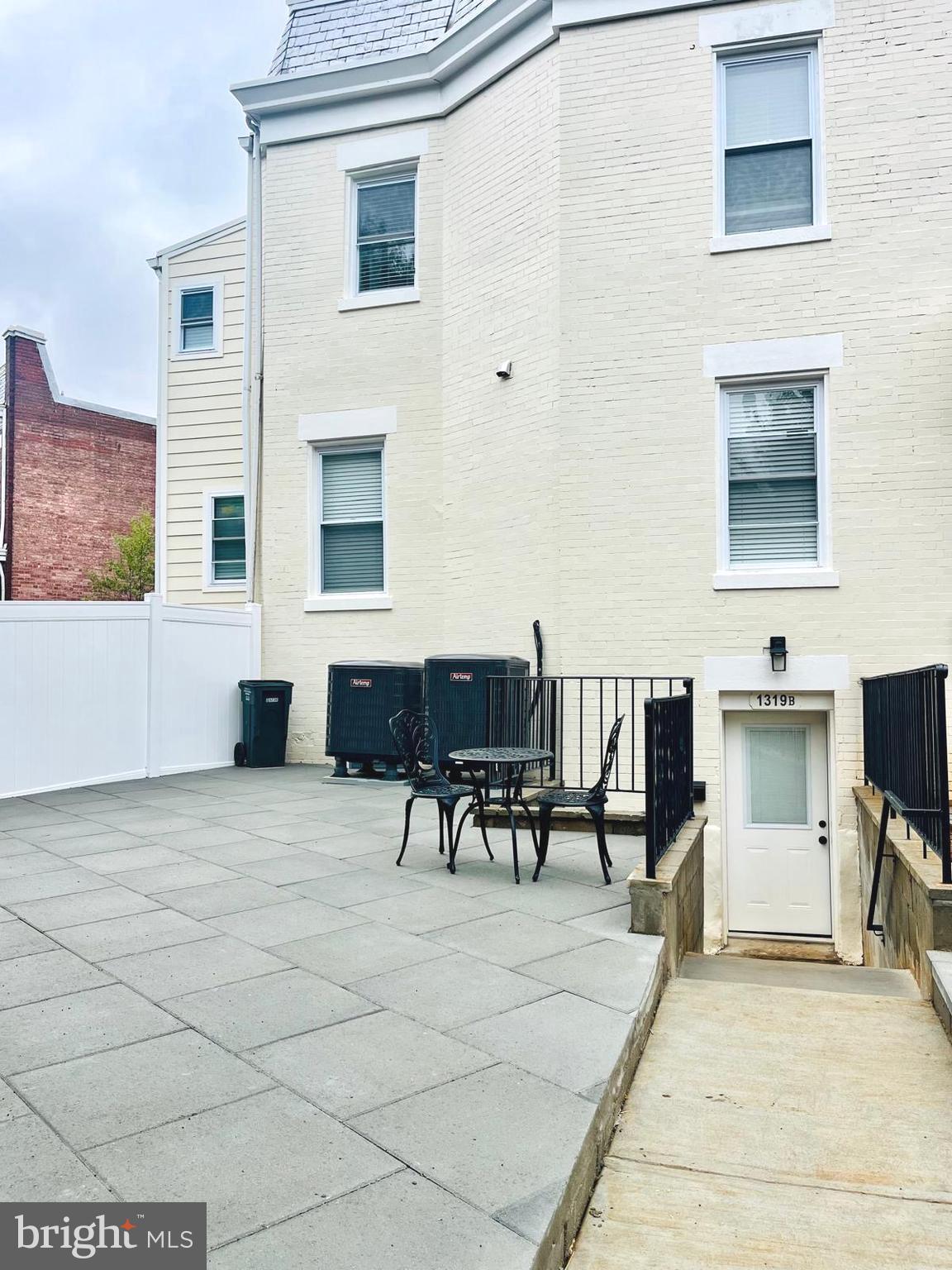 1319 C Street Northeast, Unit B Washington, DC 20002 - Photo 12 of 14 a view of a dinning table and chairs in the patio