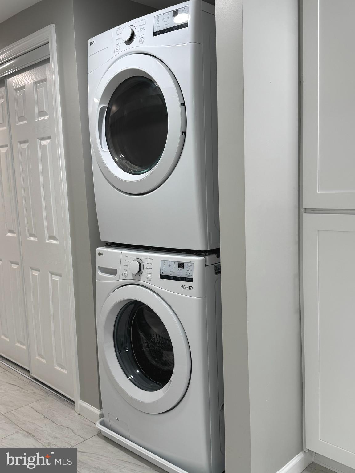 1319 C Street Northeast, Unit B Washington, DC 20002 - Photo 10 of 14 a utility room with dryer and washer