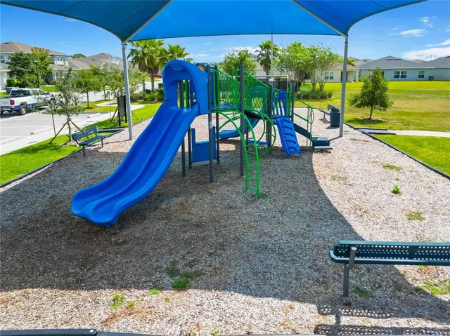a view of a park with slide