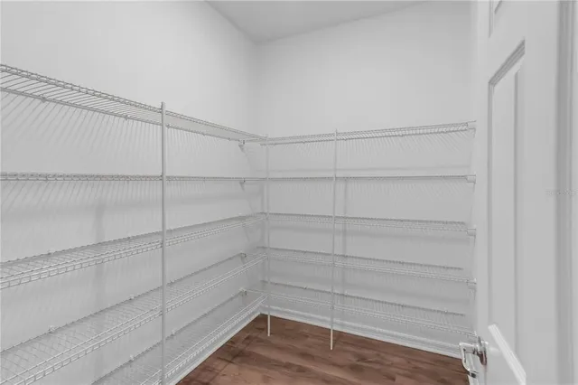 a view of a room with racks on the wall