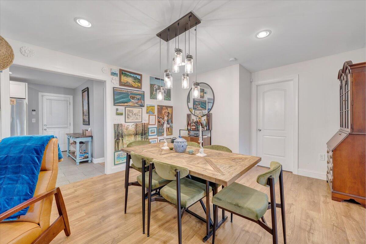 4515 Yellow Mountain Road Roanoke, VA 24014 - Photo 12 of 52 a view of a dining room with furniture and wooden floor