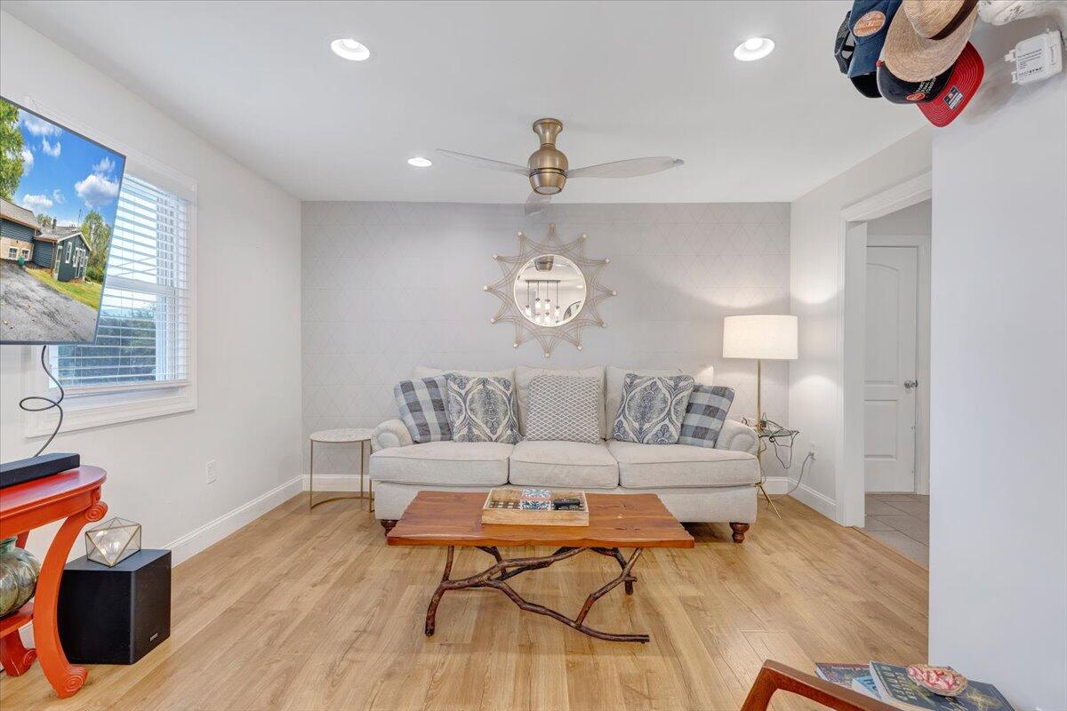 4515 Yellow Mountain Road Roanoke, VA 24014 - Photo 14 of 52 a living room with furniture and a wooden floor