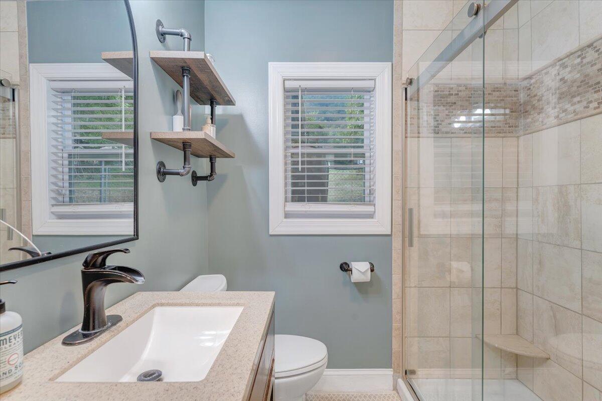 4515 Yellow Mountain Road Roanoke, VA 24014 - Photo 27 of 52 a bathroom with a sink toilet and shower